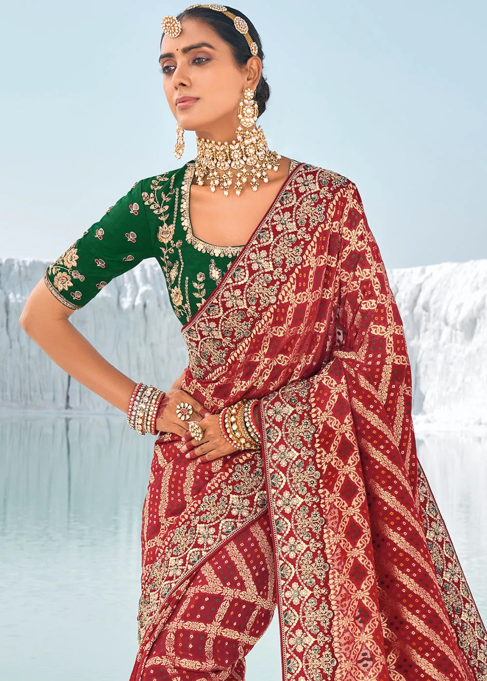 Maroon Red Georgette Silk Saree Featuring Zari Weave, Bandhani, and Patola Design