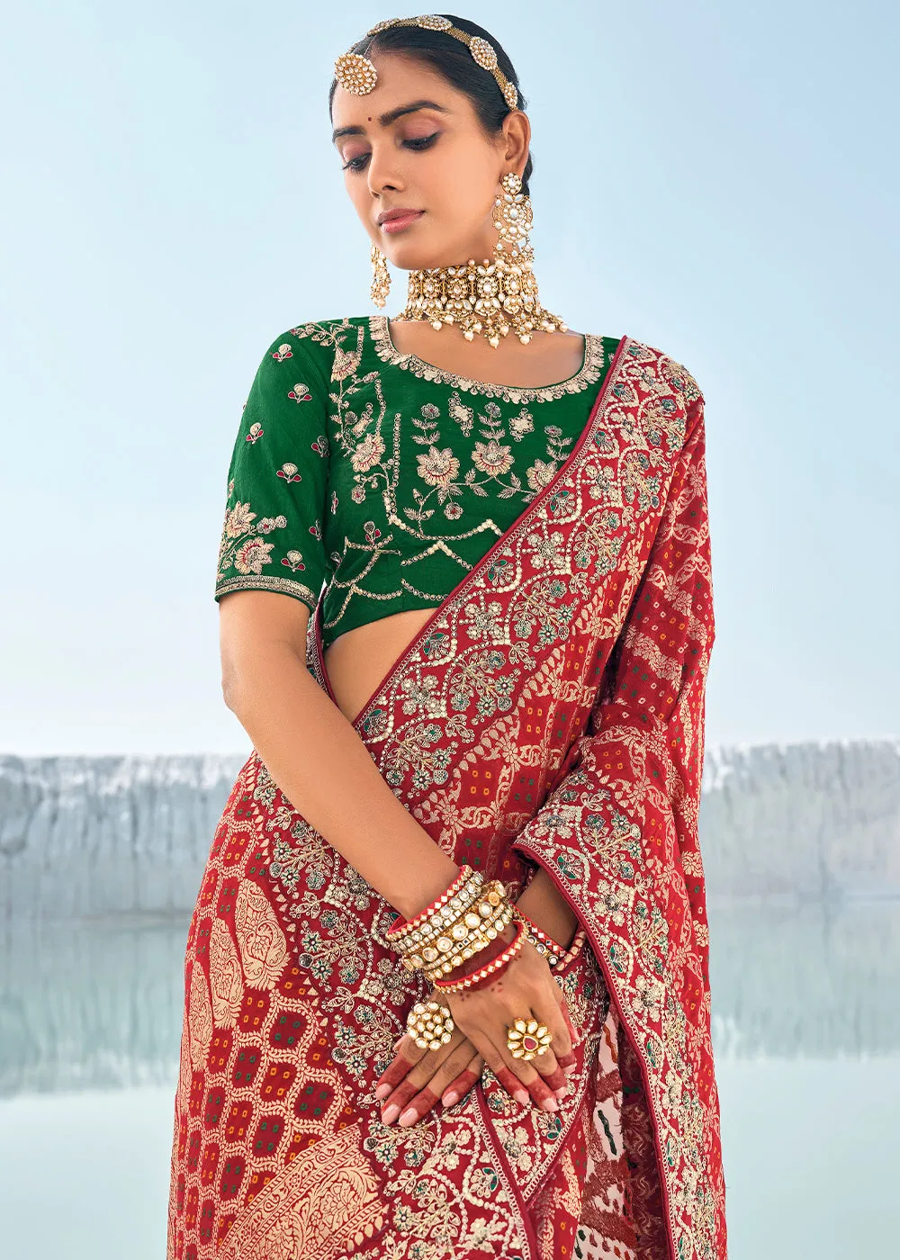 Maroon Red Georgette Silk Saree Featuring Zari Weave, Bandhani, and Patola Design